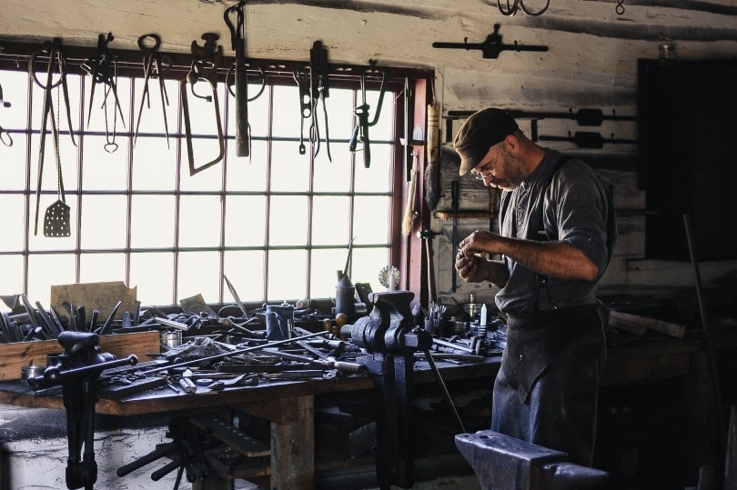man working metal craft