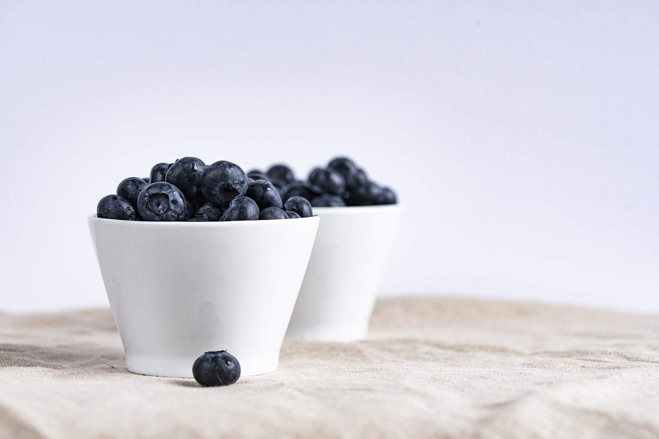 two bowls of blueberries