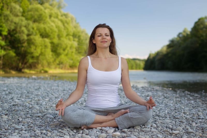 woman meditating outdoor